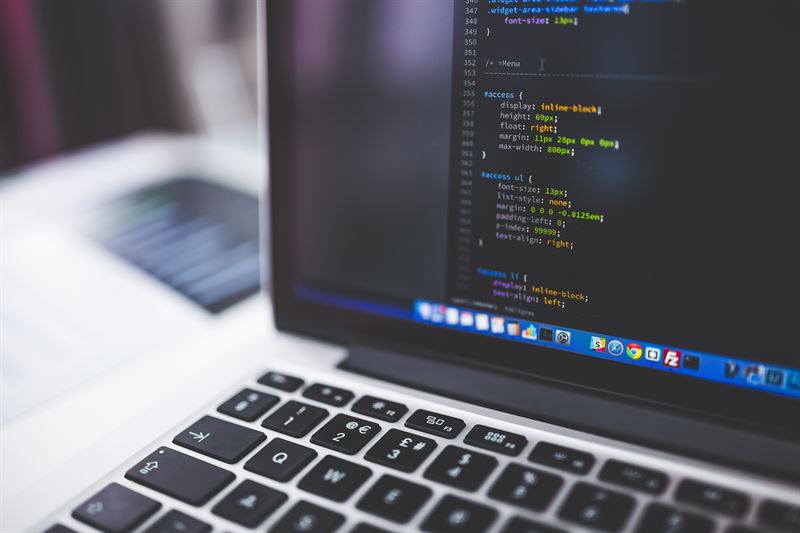 Gray Laptop Computer Showing HTML Code in Shallow Focus Photography