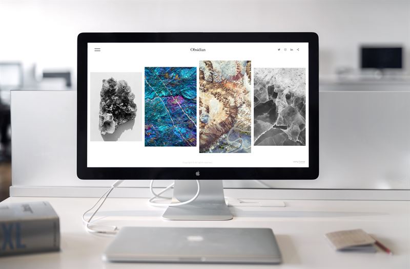 Photo of iMac Near MacBook
